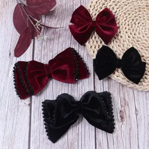 Mollette per capelli in velluto con perline nere, design con bordi in cristallo, accessori chic.