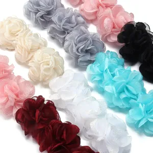 Close-up detail of chiffon organza camellia flower DIY trims, showing fine petal texture.