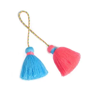 Bohemian double tassel pendant detail, colorful braided string hanging ornament for decor.