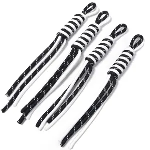 Closeup of black and white braided polyester DIY cords, ideal for trendy phone charms.