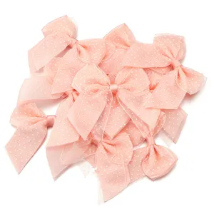 Pink polka dot mesh double layer bows for DIY hair clips crafts and apparel accessories.
