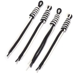 Close up of black and white braided polyester ropes, ideal for DIY keychains and bag accessories.