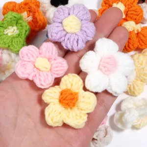 Detail view of handmade crochet flowers milk cotton yarn DIY accessories for crafting and decor