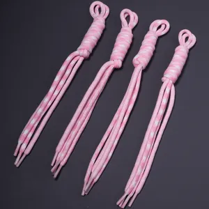 Detail view of pink and white polyester handmade braided phone hanging rope DIY accessories.