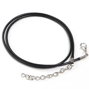 Close up of black waxed cord necklace with silver lobster clasp and extension chain.