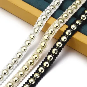 Detailed view of polyester braided lace trim featuring golden beads for DIY crafts.