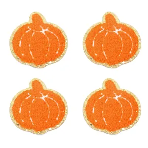 Toppa ricamata in ciniglia di zucca arancione all'ingrosso con bordo dorato per vestiti.
