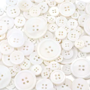 Wholesale white natural shell buttons 4-hole round sewing buttons for shirts crafts and clothes.