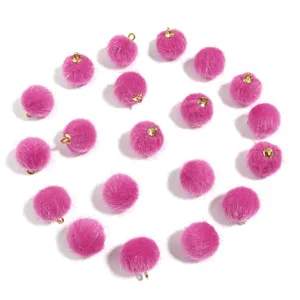 Vibrant hot pink fluffy pom pom pendants with gold loop for DIY jewelry accessories crafts
