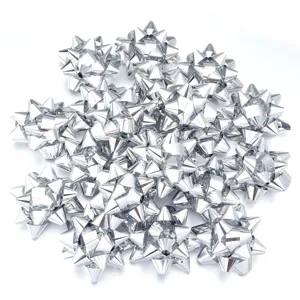 Detail view of silver laser star ribbon bows, perfect for Christmas party gift decoration.