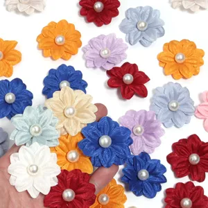Detailed close-up showing colorful polyester double-layer faux pearl flower patches.