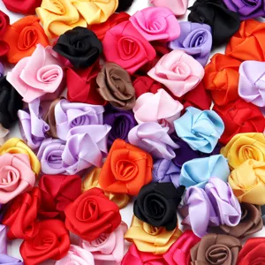 Colorful fabric ribbon roses for DIY crafts, hair accessories and clothing decoration.