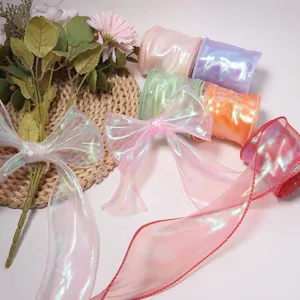 Colorful iridescent wavy yarn ribbon for bouquet gift wrapping and party decoration details.