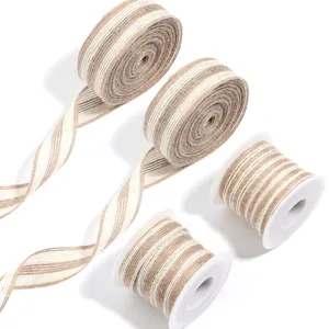 Detail shot of white-edged natural jute twine rolls and spools, ideal for DIY crafts.