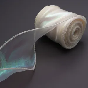 Detail shot of iridescent sheer ribbon roll, perfect for gift wrapping and party decor.