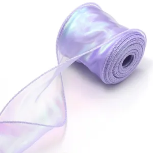 Close-up detail of light purple iridescent organza ribbon roll with wavy edge for gift wrap.