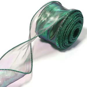 Detail view of iridescent organza ribbon for floral bouquet gift wrapping and party decor.