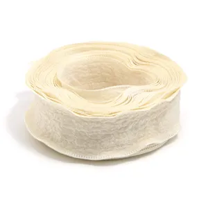 Beige polyester ruffled bubble crepe ribbon for gift packaging and DIY hair accessories.