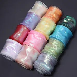 Colorful iridescent organza ribbon rolls for gift wrapping, bouquet packaging and party decor.