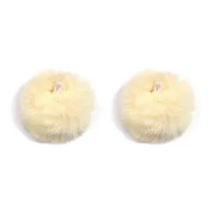 Fluffy cream pom pom pendant detail, soft fur ball accessory with hanging loop for DIY crafts.