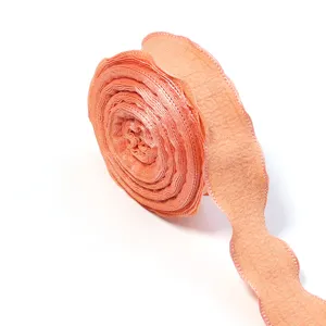 Polyester ruffled bubble crepe ribbon for gift wrapping, crafts, bows, and sewing accessories.