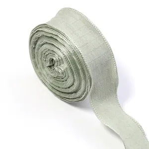 Detail view of light green polyester bubble wrinkle ribbon for gift wrapping, bows, and crafts.