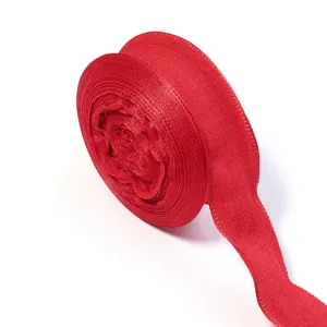 Red polyester ruffled bubble pleated ribbon detail showing fine texture for gift wrapping crafts.