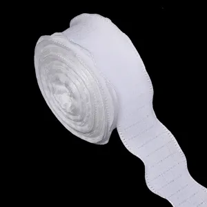 White ruffled crinkle ribbon detail view, perfect for gift wrapping, bows, and craft projects.