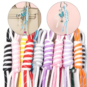 Colorful DIY handmade braided phone strap bag charm accessory with butterfly and pearl