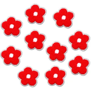 Toppe di fiori ricamate in ciniglia rossa con bordo glitterato argento per fai da te.