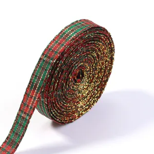 Detailed view of the Christmas metallic red and green plaid ribbon roll for holiday gift wrapping.