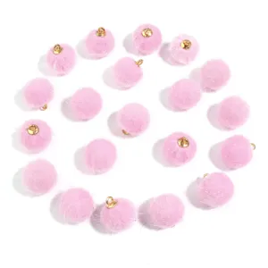 Pink faux fur pom pom charms with gold loop fasteners for DIY jewelry keychains phone straps.