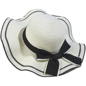 Womens summer wide brim straw hat with black bow and edge, elegant beach sun protection hat.