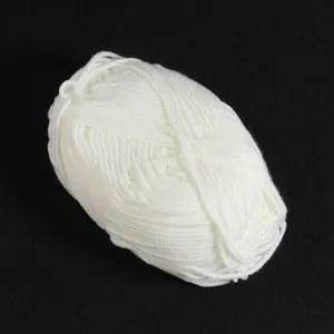 Close-up of white 5-ply milk cotton yarn ball, perfect for soft handmade knitting and DIY projects.