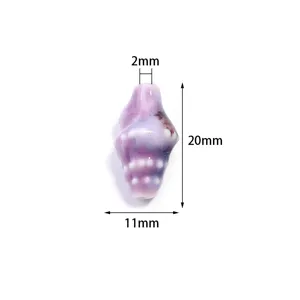 Ceramic conch shell bead detail shot, high temperature glaze color, perfect for DIY jewelry making.