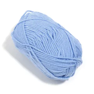 Close-up of light blue 5-ply milk cotton yarn ball, soft texture for DIY knitting crafts.