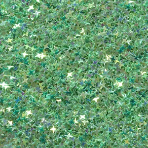 Close-up detail shot of green star shaped PVC glitter sequins for craft nail art decoration.