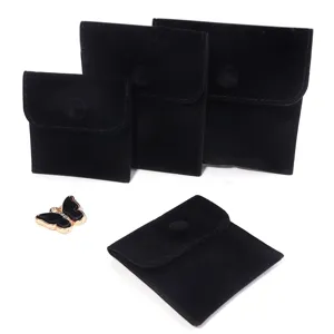 Black velvet jewelry storage pouches set with snap button closure for travel ring necklace.