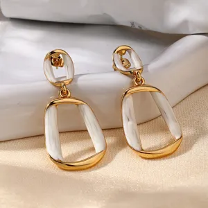 Eleganti orecchini pendenti cavi intrecciati in acciaio inossidabile, gioielli vintage.