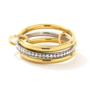 Stainless steel multi-layer stacked ring with sparkling crystals, modern two-tone design.