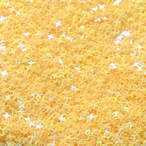 Yellow four-pointed star sequins for nail art, DIY crafts, and clothing decoration.