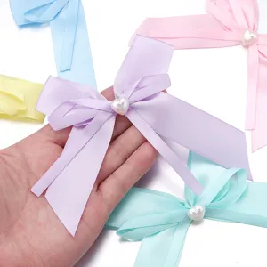 Fiocco in nastro pastello con perla a cuore per accessori per capelli e cucito creativo.