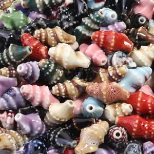 Vibrant ceramic conch shell beads for DIY jewelry making, bracelets, and crafts.