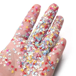 Colorful butterfly sequins for nail art DIY crafts, shiny PVC flakes for handmade design.