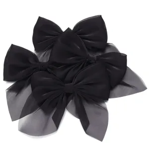 Black chiffon bow hair clips detail shot, elegant layered hair accessories for women and girls.