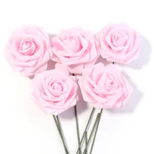 Pink PE foam artificial rose flowers with green stems for bouquet and DIY craft decor.