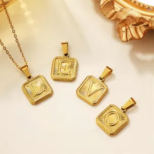 Gold stainless steel square letter pendants necklace set featuring L E V O initial charms.