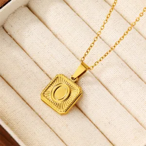 Gold stainless steel letter O necklace pendant close-up view fine detail fashion jewelry