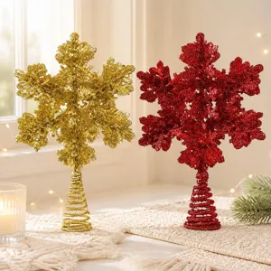 Glitter gold and red snowflake Christmas tree topper with spring base holiday decor detail shot