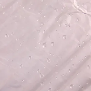Transparent plastic garment dust cover for suits and coats, waterproof protective bag.